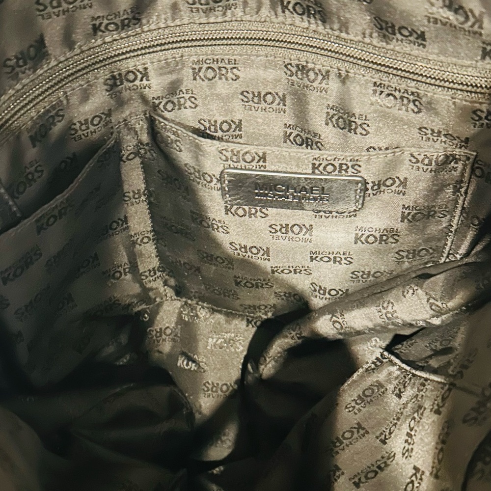 Michael Kors Black Tote Bag with MK logo throughout bag. - Picture 4 of 16